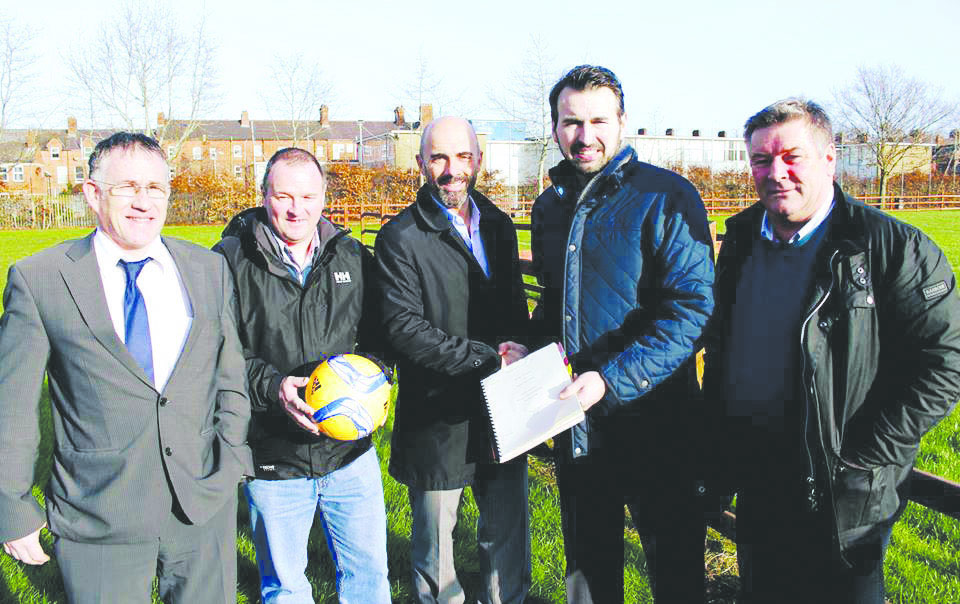 Rosario FC Chairman Pat McGonigle (centre_ along with Noel McKenna (right) and Ryan Haire from Belfast City Council after the signing of the new partnership agreement at Ulidia