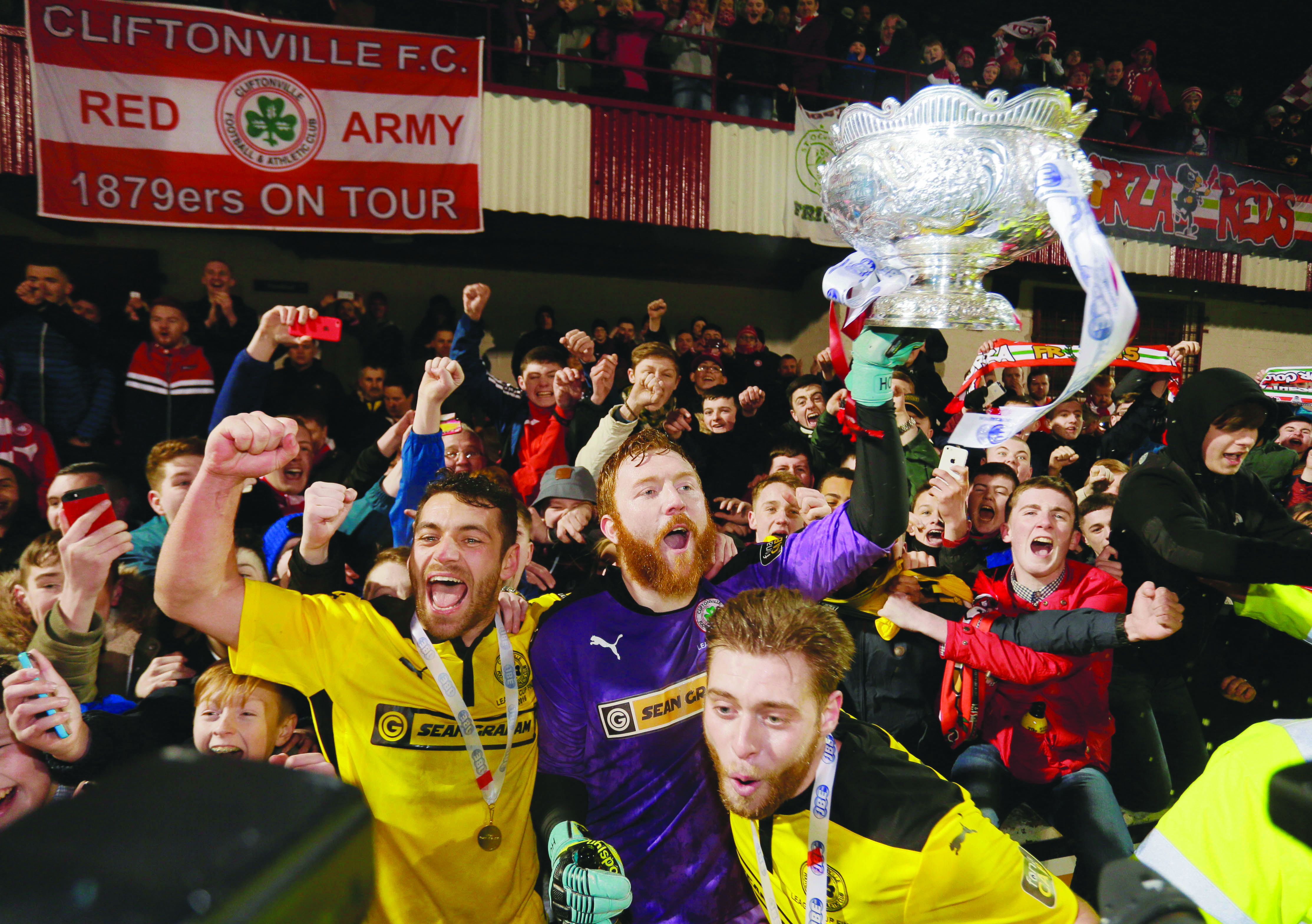 Cliftonville players celebrate with the fans after Saturday’s League Cup final victory over Ards at Solitude