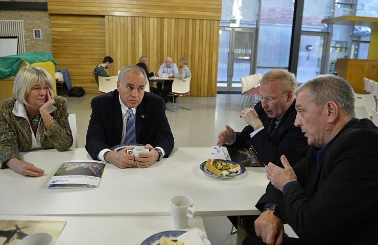 Comptroller Tom DiNapoli and his aide Pat Doherty discuss the impact of US investment on working class communities with UDA leader Jackie McDonald and the Rev Margaret Ferguson during a visit to the East Belfast community centre Skainos in October 2014.