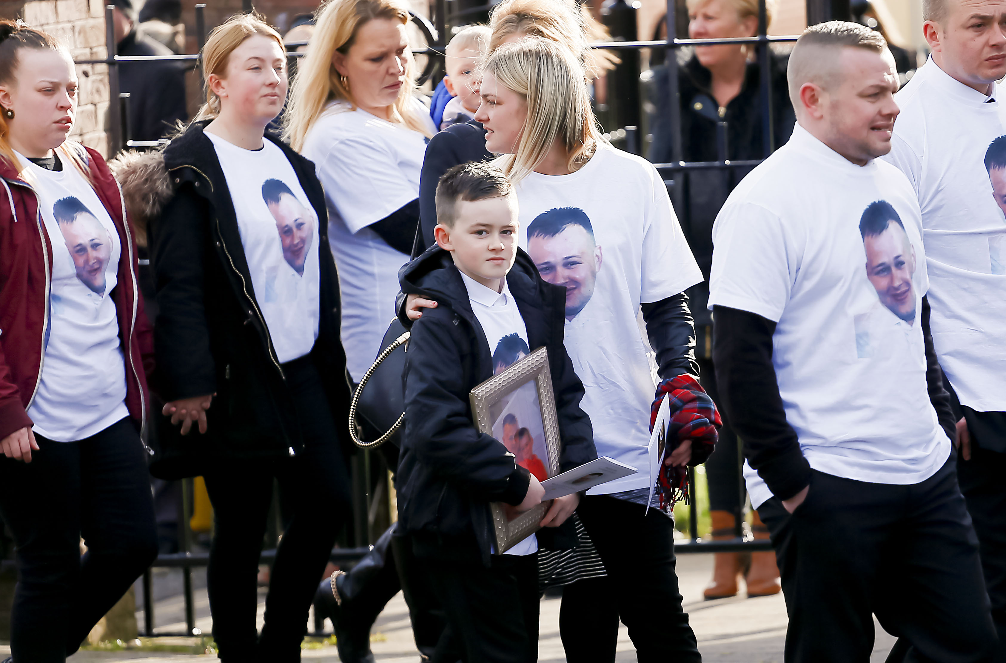 Mourners, including Stephen Carson’s fiancée and sons, wore t-shirts bearing the dead man’s picture    Pic by Kevin Scott\nBelfast , UK - March 05, Pictured is the funeral of Murder victim Stephen Carson at Holy Trinity Church in west Belfast on March 05, 2016  Belfast, Northern Ireland ( Photo by Kevin Scott / Presseye)