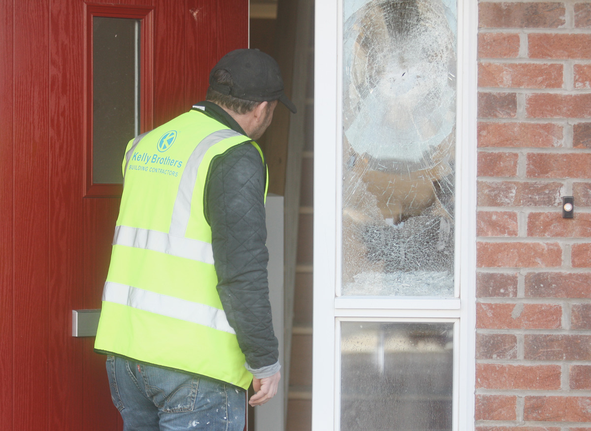 DISGRACE: One of the windows that was damaged by vandals