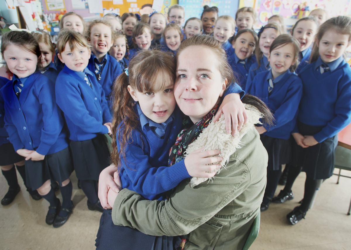 Holly McDowell back to school for the first time since open heart surgery with Mother Hanna