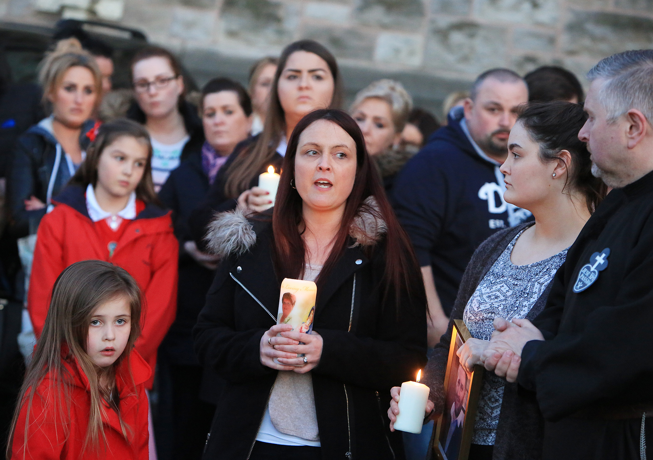 Joanne McGibbon addresses the crowd at the vigil to her murdered husband last week