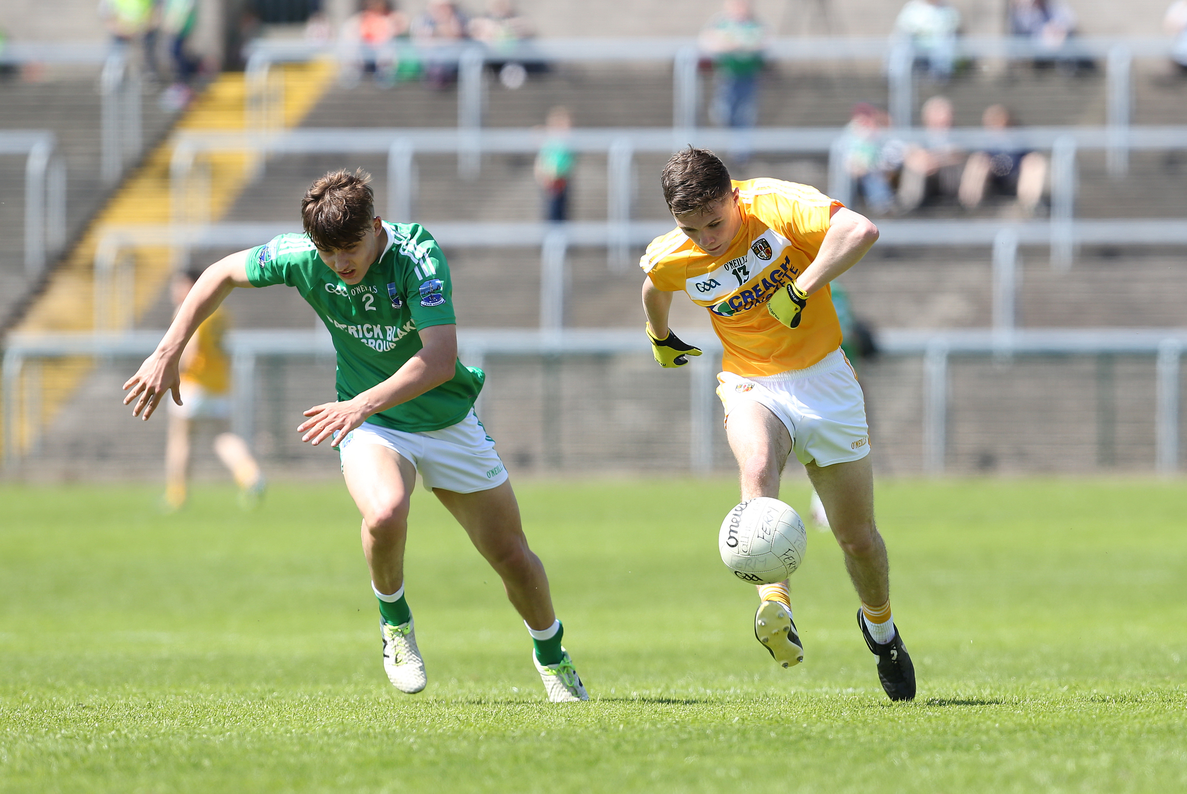 Antrim forward Liam Quinn, pictured in action against Fermanagh’s Johnny Cassidy, will miss Sunday’s Ulster MFC quarter-final tie against Donegal after breaking his ankle against the Ernemen