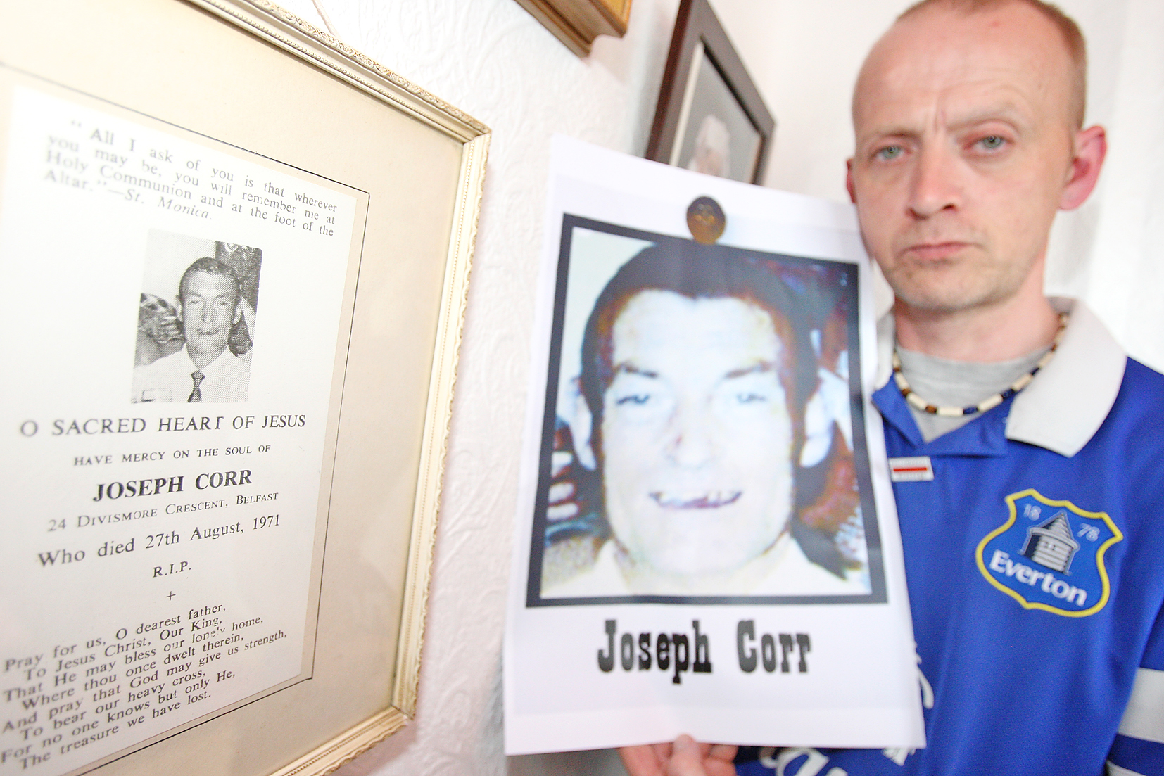 Mickey Corr with a picture of his grandad Joseph Corr, killed in the Ballymurphy Massacre. Mickey wants to get to the truth for his dying dad
