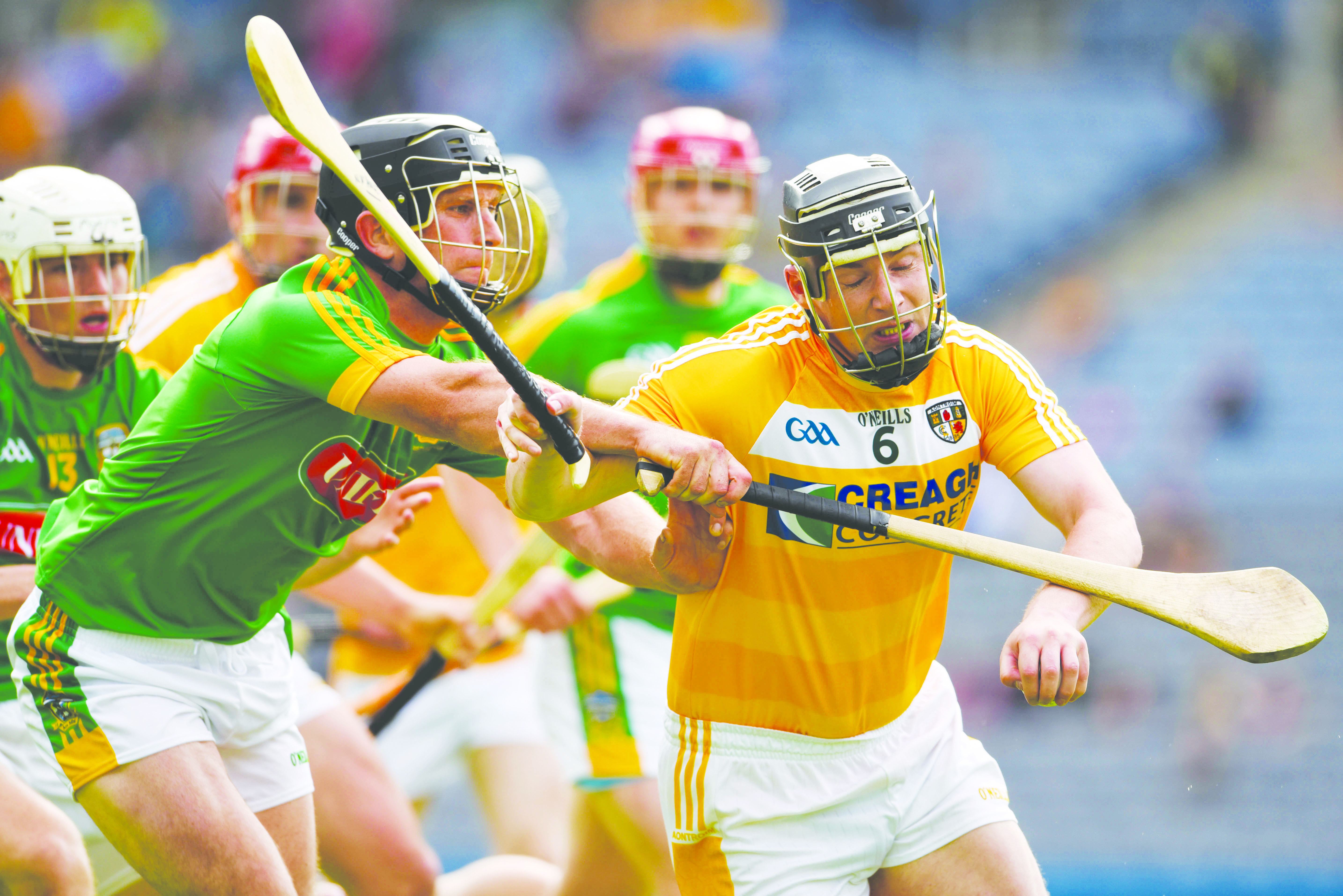 Antrim\'s Neal McAuley holds off the challenge of Meath’s Joey Keena during last Saturday’s Christy Ring Cup final in Croke Park. The GAA’s Central Competitions Control Committee (CCCC) has ordered the game to be replayed after a score-keeping error resulted in Meath collecting the cup despite the game ending in a draw