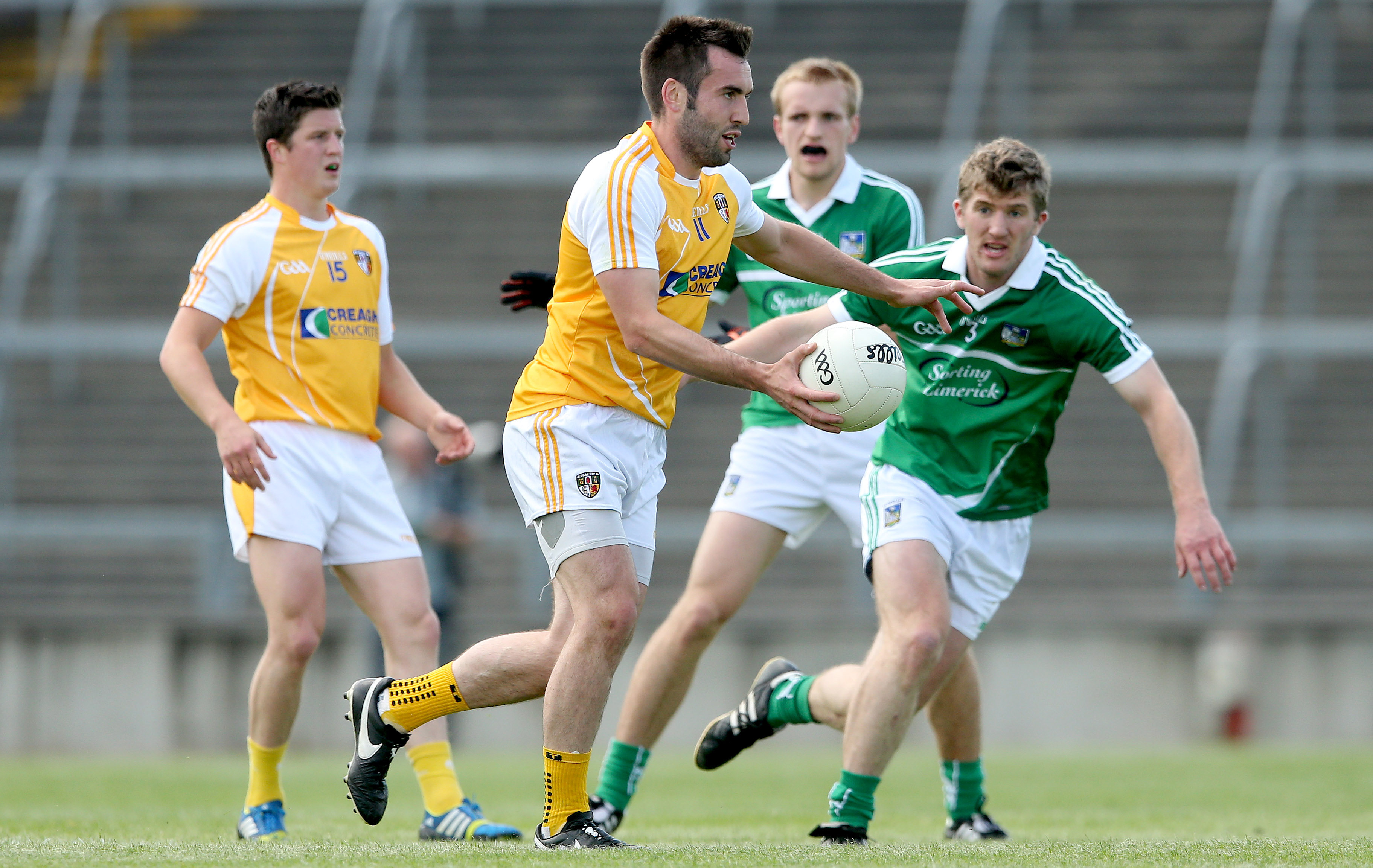 Antrim’s Kevin Niblock gets away from Johnny McCarthy of Limerick during the Qualifier clash in the Gaelic Grounds in 2014. The sides meet again in Corrigan Park on Saturday