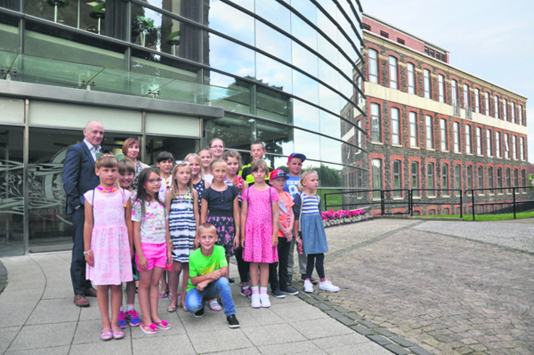 Young visitors from the Chernobyl region of Belarus on their visit to Mossley Mill