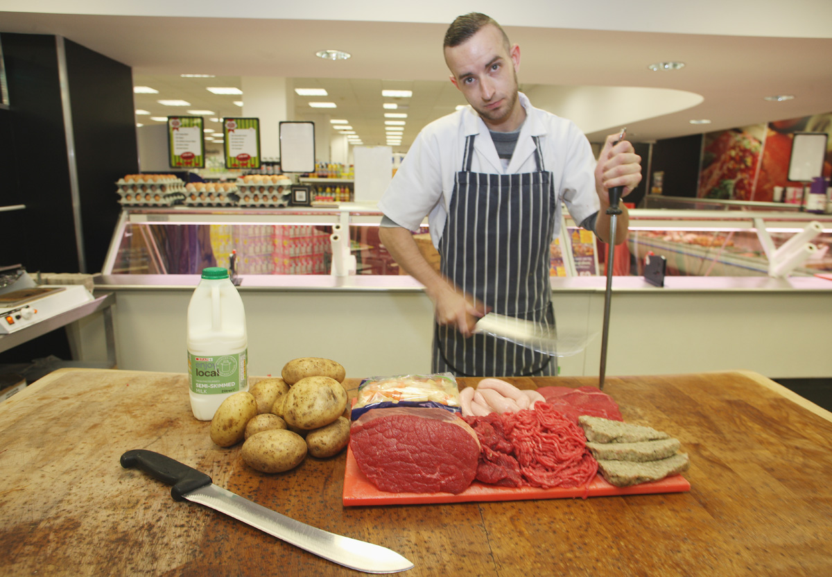 Butcher Ciaran McKee with £20 pack at Saveways Ardoyne