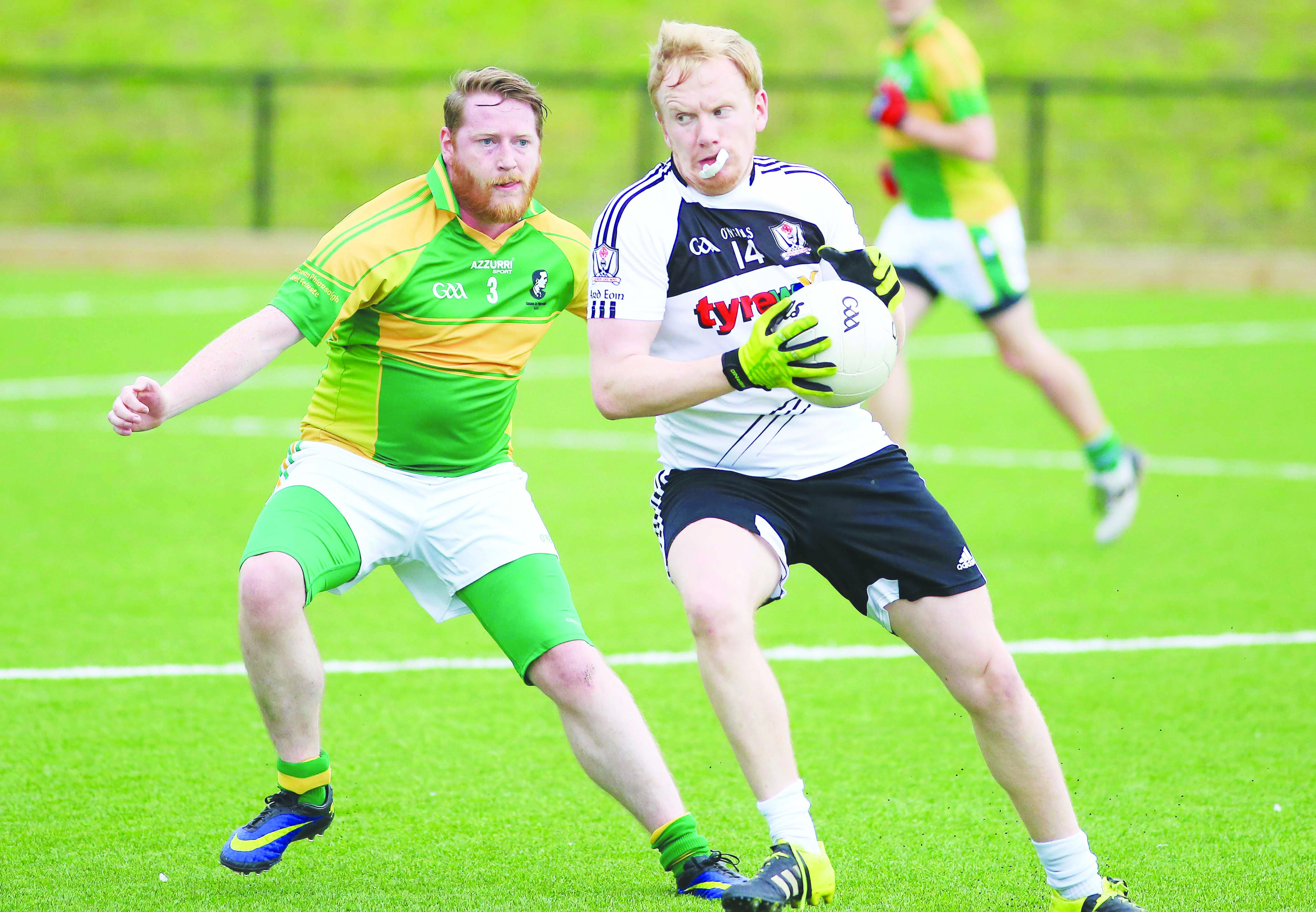 Ardoyne full-forward Ciaran McNeill claims possession ahead of Pearse\'s full-back Tomas O\'Neill during the JFC clash between the sides last Sunday. The Kickhams are back in action this week when they take on Mitchel\'s for a place in the last four