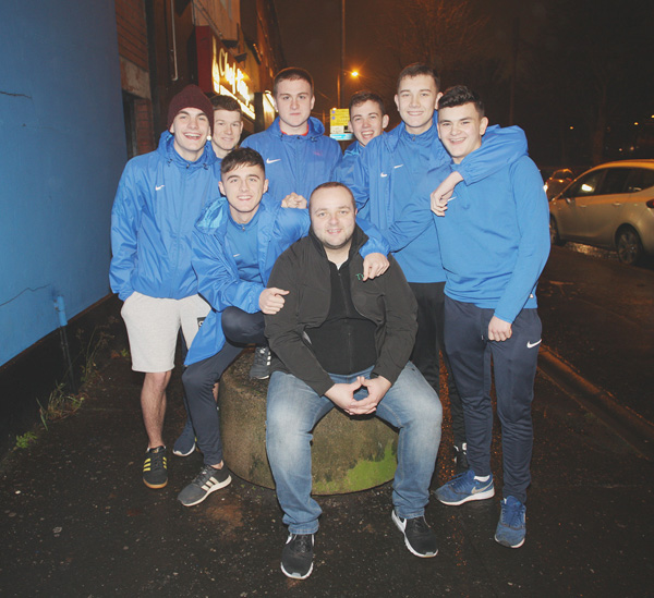 Paddy Doyle with members of the Turas Youth project on the Antrim Road