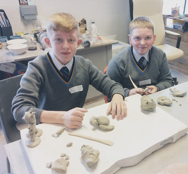 VALUABLE LESSONS: Aidan Bradley and Mathew Murphy get to grips with clay modelling