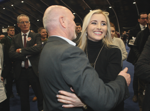 Poll topper Órlaithí Flynn celebrates with Alex Maskey