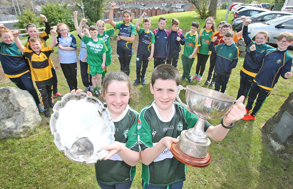 The launch of the Liam Murray Cup in Coláiste Feirste with Liam and Amy Murray, along with the pupils from Irish language schools, who are competing in this year’s 2017 competition