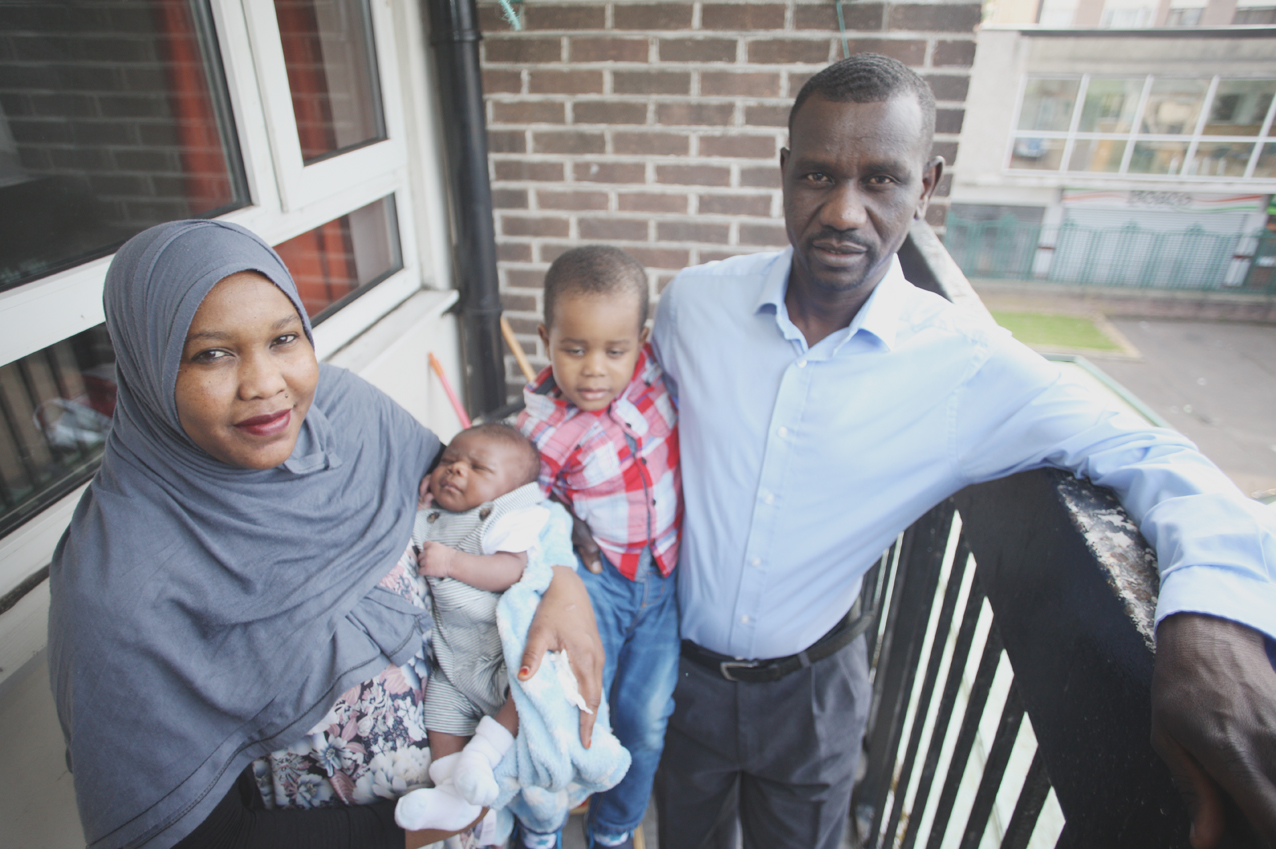 STRANDED: Mohammed Idris with his wife Darelsalaam Yaquob and children Anan (2) and Azam (3 months), they also have a 9-year old son, Alaa; the family continue to live in a cramped two-bedroom flat three years after a racist attack
