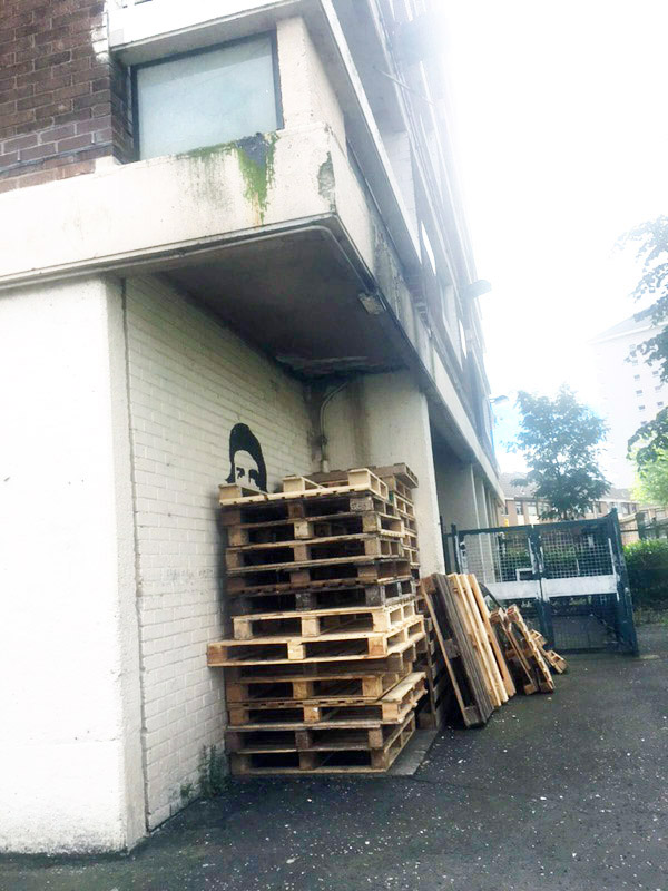 LETHAL: Pallets stacked underneath one of the seven New Lodge tower blocks have pushed residents to breaking point as the danger of flammable materials in residential areas continues