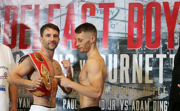 Ryan Burnett points to the IBF bantamweight title belt as Lee Haskins smiles out into the crowd during today\'s weigh-in at the Hilton Hotel\nPicture by Jonathan Porter/PressEye.com