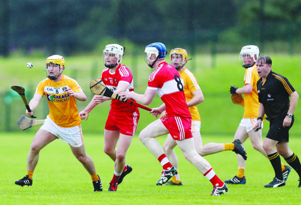 Antrim’s Michael McGreevy gets away from Derry duo Eoghan O’Kane and Martin Quinn during the Ulster final at Owenbeg. The provincial champions return to action on Saturday when they take on Dublin in the All-Ireland quarter-final in Newry