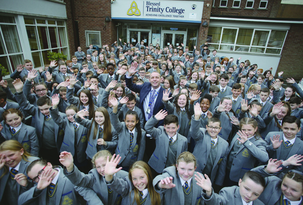 ACHIEVING EXCELLENCE TOGETHER: The new Year 8’s with Principal Jim McKeever at Trinity College