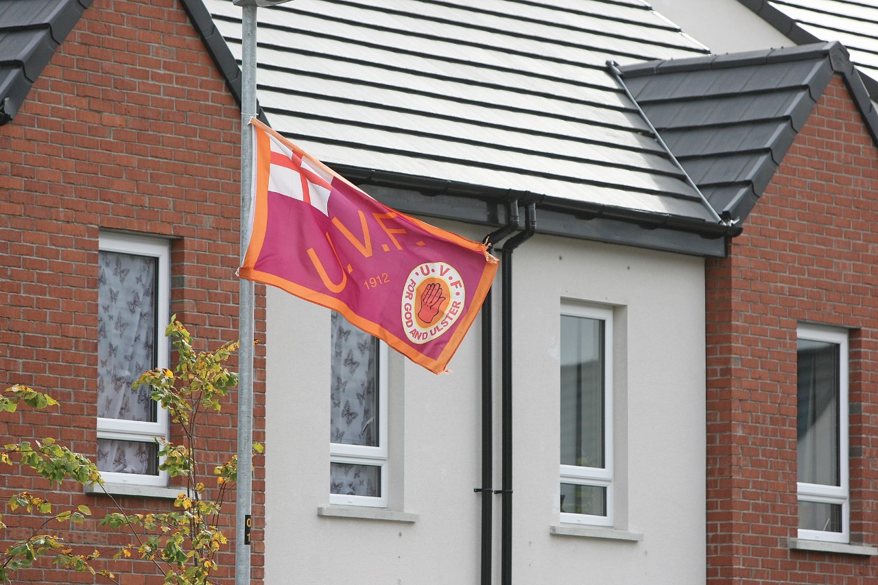 INTIMIDATION: Cantrell Close, where the Catholic families were forced to flee, still had UVF flags flying yesterday, Thursday\n