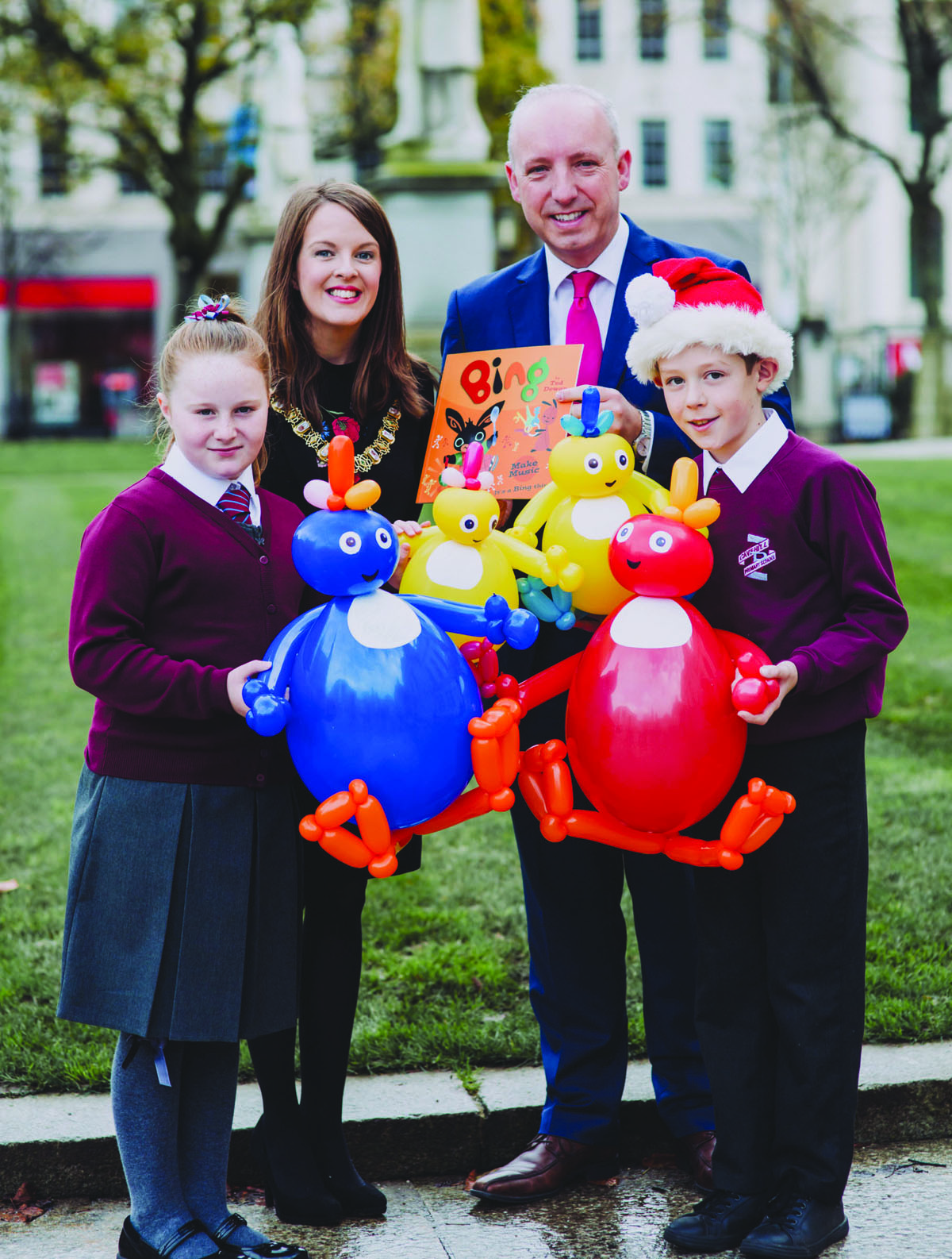 FESTIVE: The Lord Mayor of Belfast, Councillor Nuala McAllister, joins Cavehill Primary School pupils Anna Adams and Finn Bryan and Principal Stephen Orr in looking forward to the Christmas lights switch-on, which takes place on Saturday, November 18