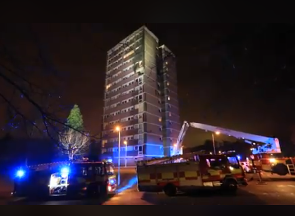 Appliances at the scene as fire rages at the tower block in the Seymour Hill estate\nPic by Jim Corr 
