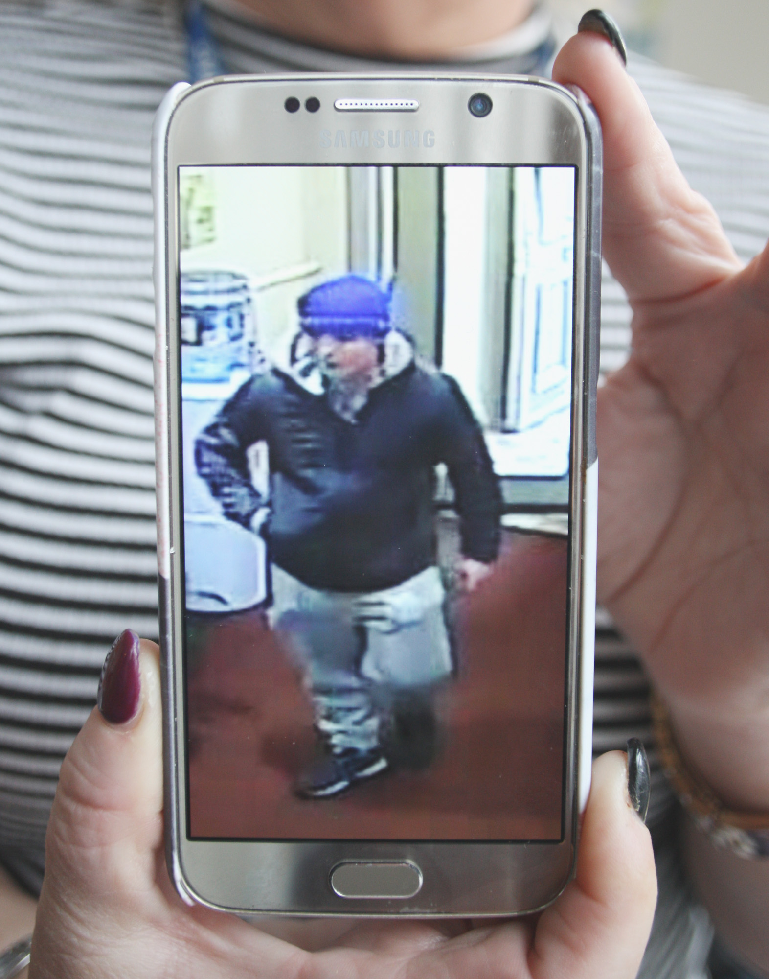  WANTED: A CCTV image of the intruder on a PIPS worker’s phone
