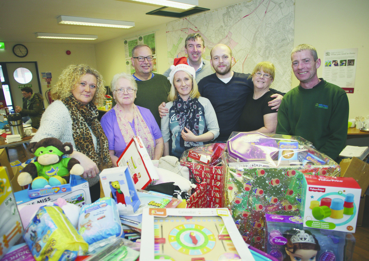 A HELPING HAND: North Belfast food bank co-ordinator Sinead McKinley and her team of volunteers delivered a record number of hampers this Christmas