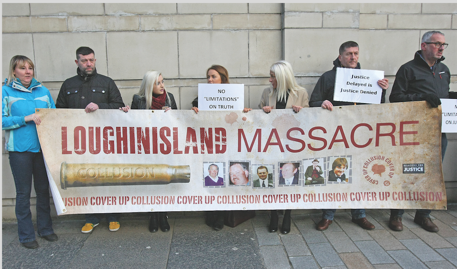 Supporters of those killed in the Loughinisland massacre gather outside Belfast High Court