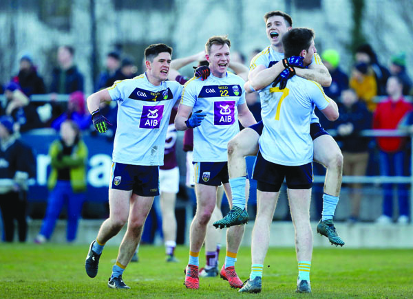 Peter Healy, pictured above, second from left with Conor Mullally, Cillian O’Shea and Jimmy Feehan, celebrates UCD’s Sigerson Cup win over NUIG last Saturday. The previous weekend, Healy was part of the Antrim side which suffered a disappointing home draw to Wicklow. The Saffrons will seek to bounce back when they face London in Ruislip on Sunday 