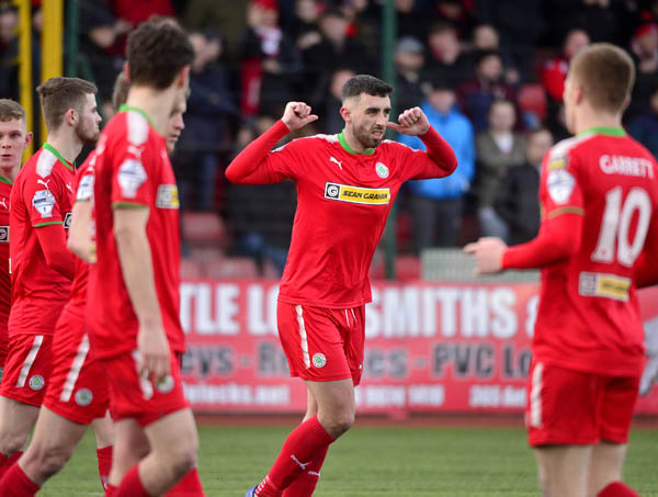 Cliftonville striker Joe Gormley celebrates after scoring his re-taken penalty during last Saturday’s 4-1 win over North Belfast rivals Crusaders in the Irish Cup at Solitude 