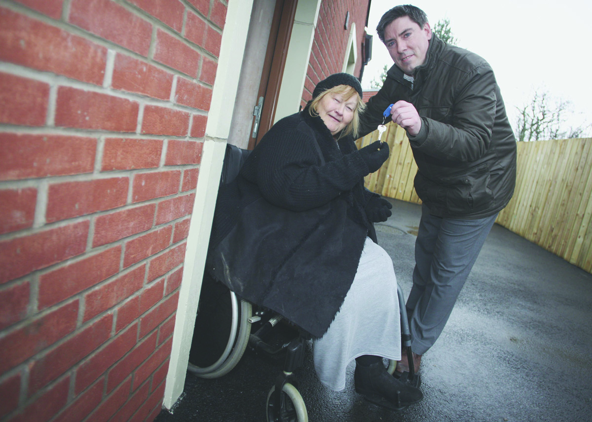 COMMUNITY-BASED: Anthony Kerr, Director of Operations at Newington Housing Association, with happy tenant Geraldine Crossey