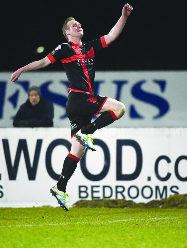 Crusaders striker Jordan Owens celebrates after putting his side 3-1 up during Tuesday night’s 6-1 win over Glenavon and the league-leaders face North Belfast rivals Cliftonville at Solitude on Saturday  