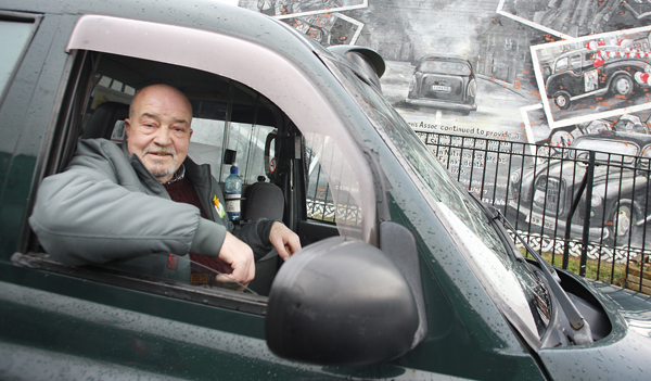 Sam Baker onboard an Ardoyne Taxi