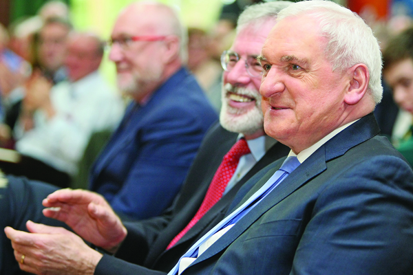 Former Taoiseach Bertie Ahern and Gerry Adams TD share a  lighter moment at an event in St Mary\'s University College to mark 20 years of the Good Friday Agreement
