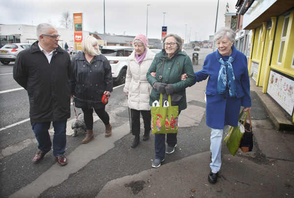 93-year-old Bernadette Carson with Tim Attwood on the Falls Road