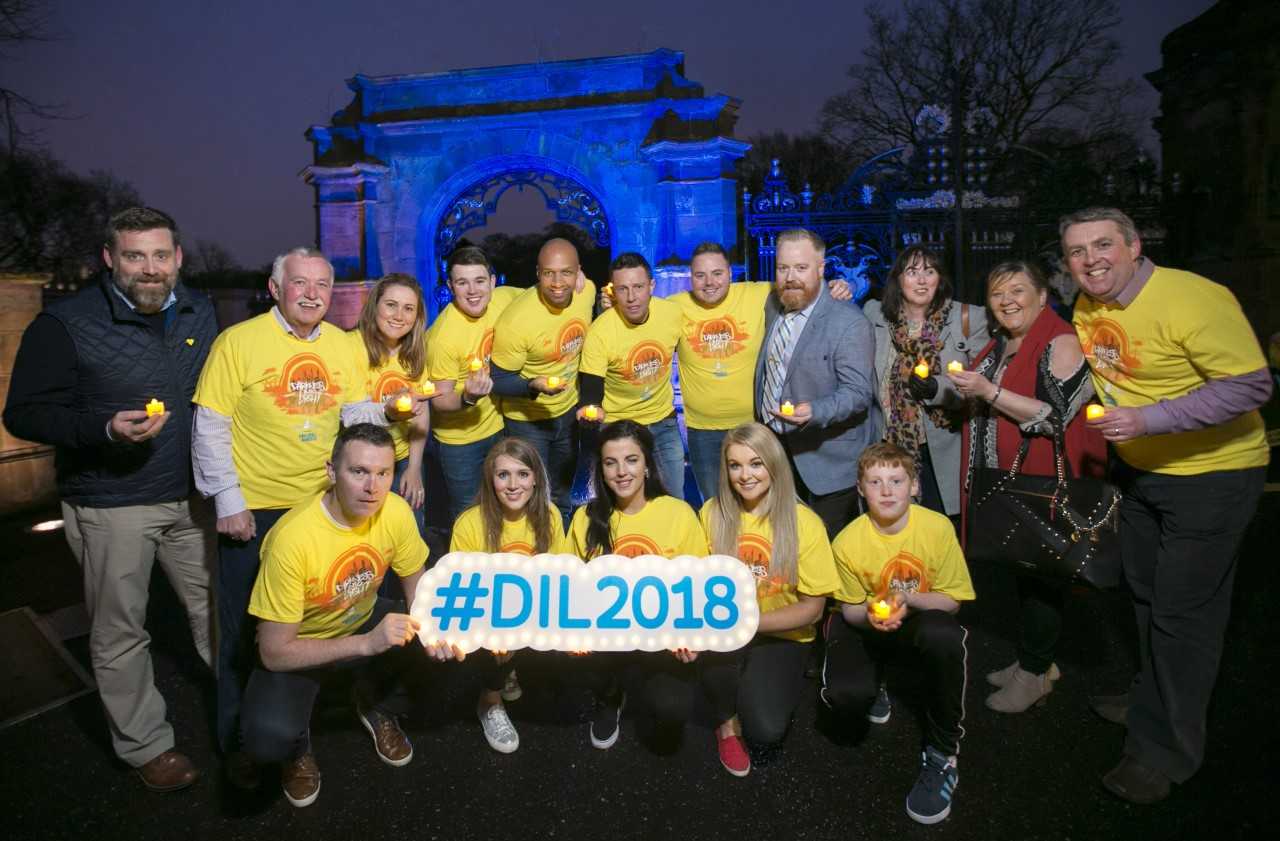TOGETHER: Hannahstown Darkness Into Light committee members join Jamie-Lee O\'Donnell from Derry Girls, sporting legend Oisin McConville, Q Radio presenters, Annette Kelly from Little Penny Thoughts and mental health nurse and blogger, Judy from French Grey Lifestyle, Kevin Caldwell of Electric Ireland, who are urging the people to walk from Darkness Into Light