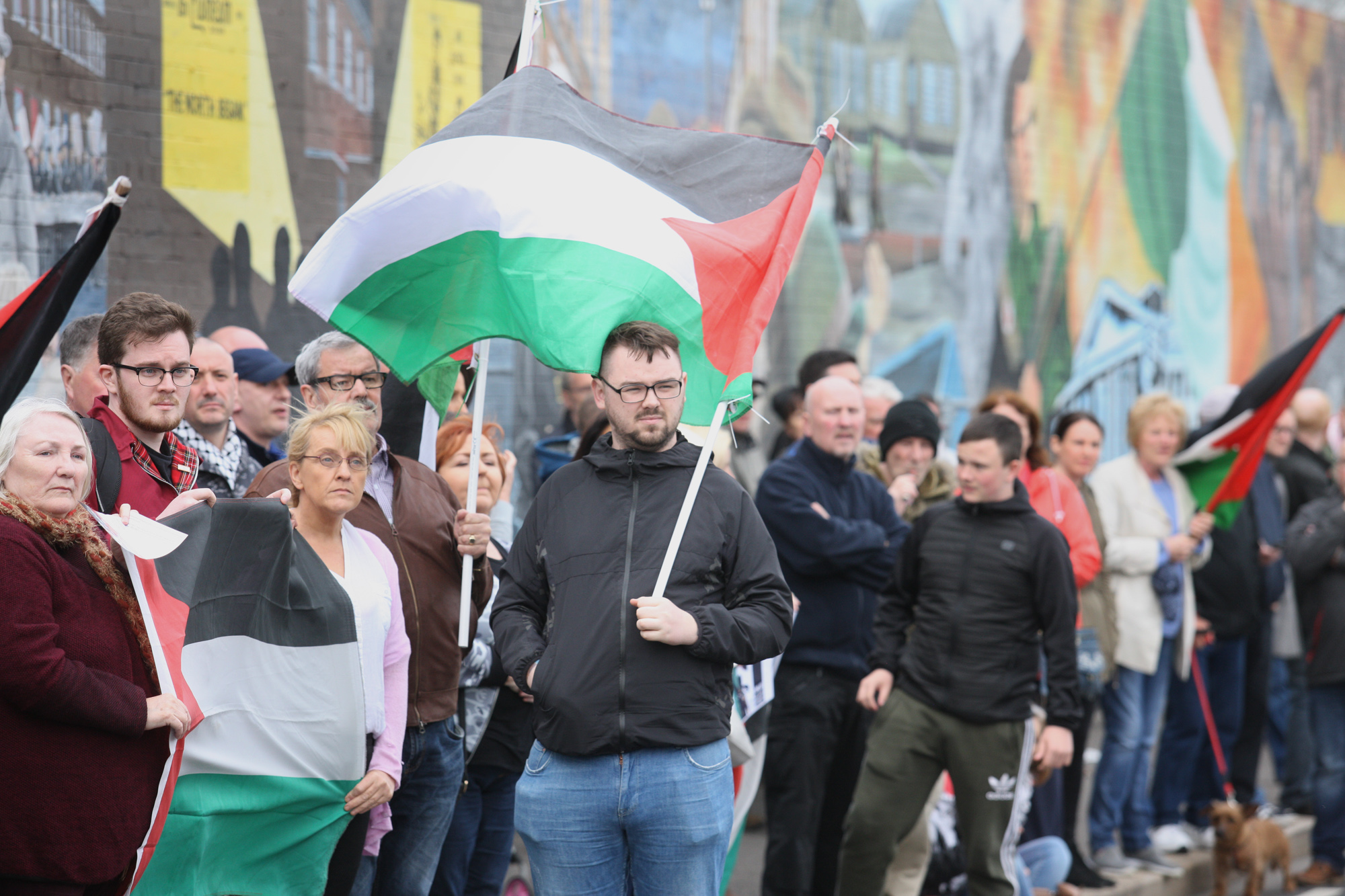 Hundreds of people took part in a Palestinian solidarity protest on Tuesday night at the International Wall on the Falls Road following the IDF killings in Gaza