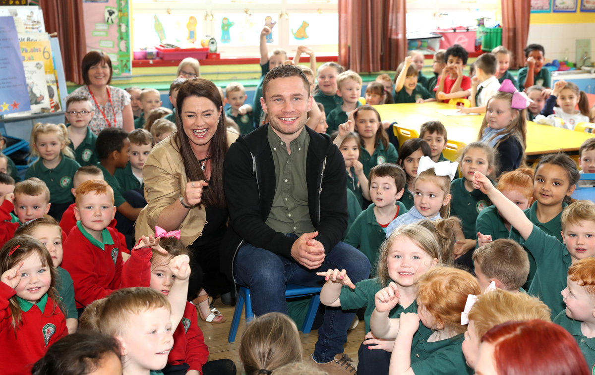 Carl Frampton with pupils from Cliftonville Integrated Primary School