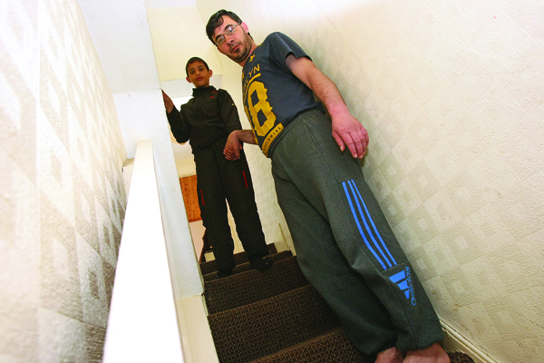 DANGEROUS: Abed Elzohby with his son Ahmad on the steep stairs