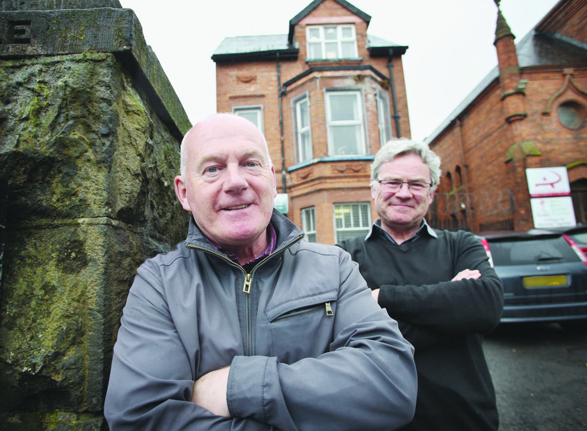 Paul O’Neill (Tar Isteach chairperson) and Tommy Quigley (manager) at the group’s premises on the Antrim Road