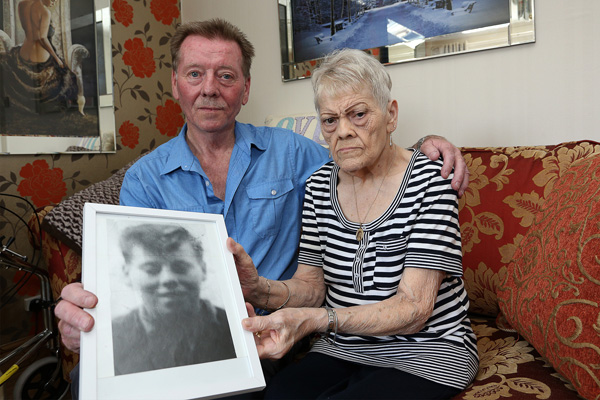 JUSTICE: Kevin Phillips and sister Lily Shanks hold a photograph of their brother Noel