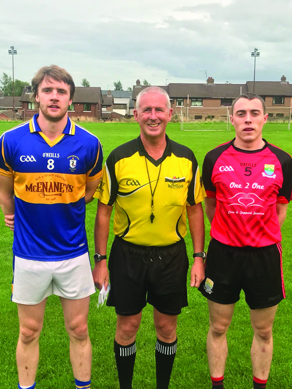 Team captains, Stephen Beatty (Rossa) and Eamonn Brady (Ahoghill) with referee, Brendan Toland before Wednesday\'s game