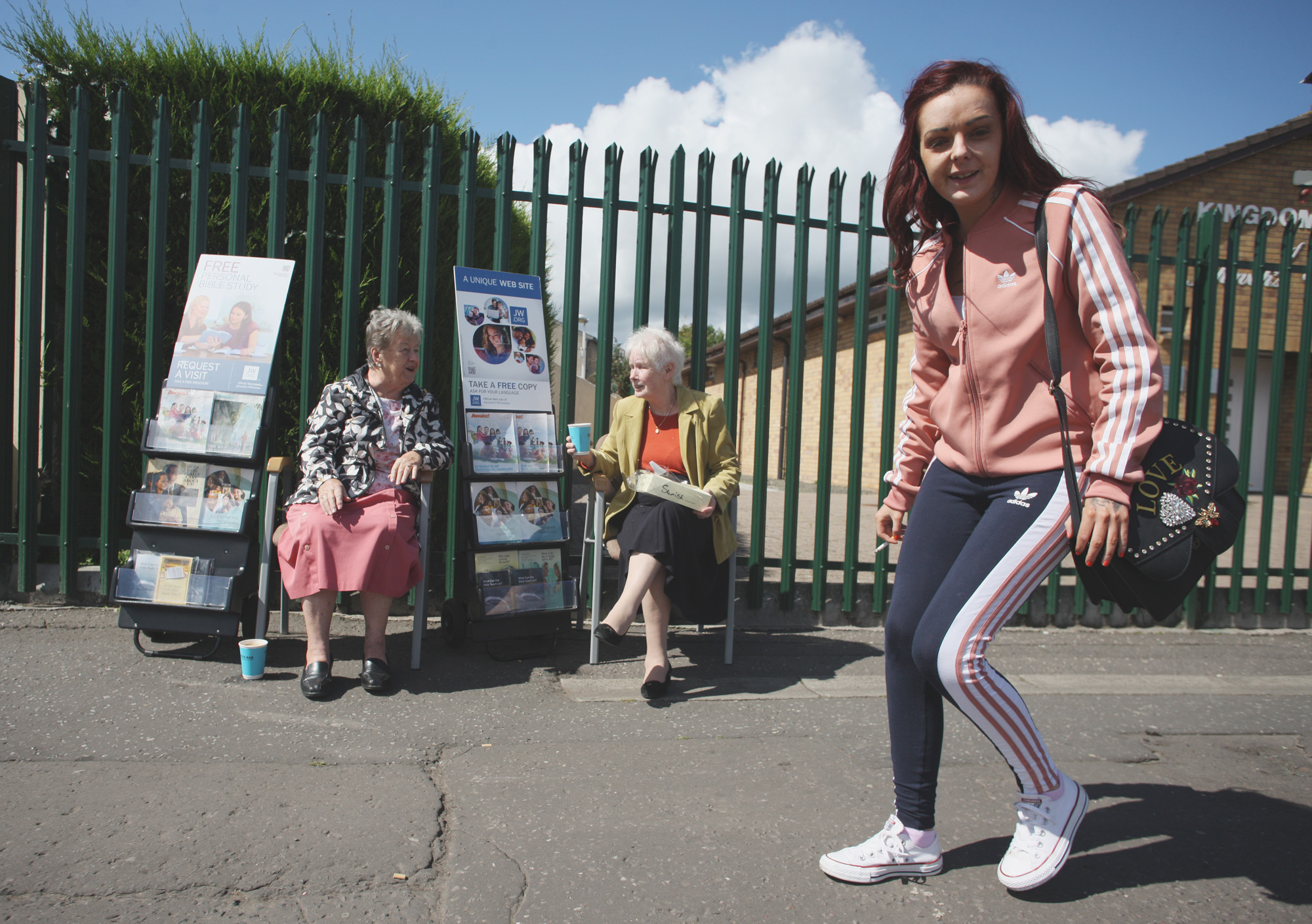 Peace and Love on the Antrin Road as Jehovah\'s Witnesses have a tea break on the Antrim Rd