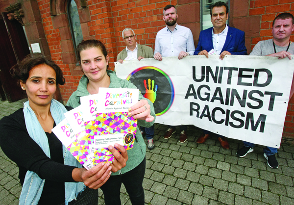 ALL TOGETHER: Cllr Ciarán Beattie, Sinn Féin; Cllr Tim Attwood, SDLP; and Gerry Carroll MLA, People Before Profit, with Ivanka Antona (chair of United Against Racism Belfast), Saeb Shaath (United Against Racism Belfast and Palestine Aid chairman) and asylum seeker Salwa Alsharabi calling for your support this Saturday