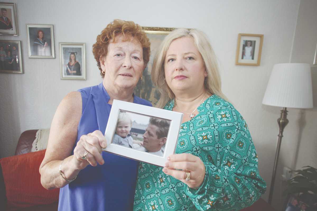 MEMORIES: Eddie’s sister Kathleen McCarry and his niece Christine McGlone with a treasured photo