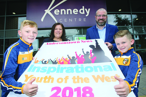 THUMBS UP: Martin and Tom McIlwaine, last year’s Most Inspirational Youth of the West, with Jacqueline O\'Donnell of the Andersonstown News and John Jones, manager of the Kennedy Centre, launching Inspirational Youth of the West 2018