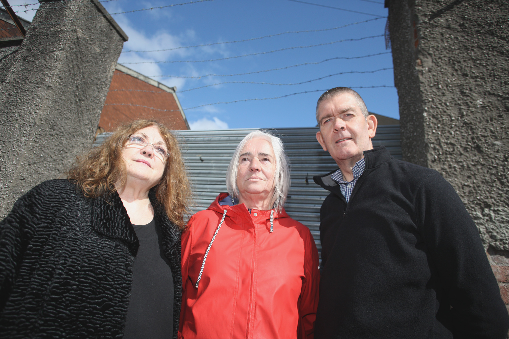 Manus Maguire from Cliftonville Community Regeneration Forum with local residents Eithne O’Kane and Terry McKeown