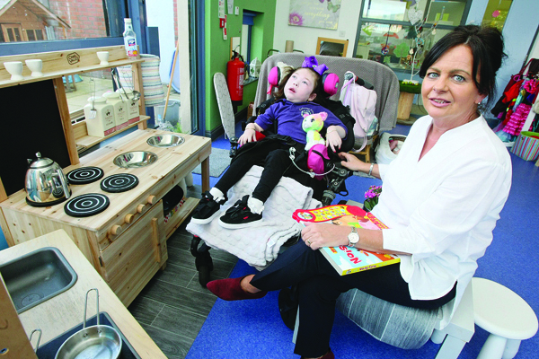 VITAL WORK: Service Manager Grace Connolly with Rubie-Mae McKeown at the Ardmonagh Family Centre