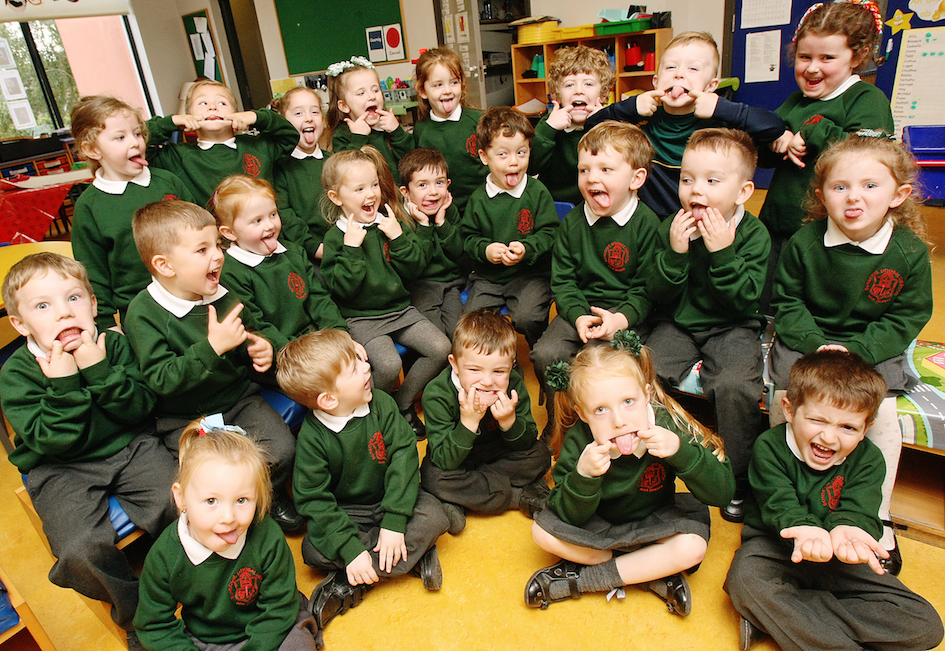 Bunscoil Phobal Feirste Rang 1 entertain the Andersonstown News photographer during a photo session for the annual Primary One Supplement, which will appear in next week’s paper